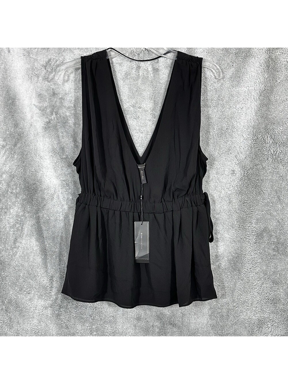BCBGMAXAZRIA Sz. L Black Peplum Blouse Sleeveless Deep V-Neck Elastic Waist Tie